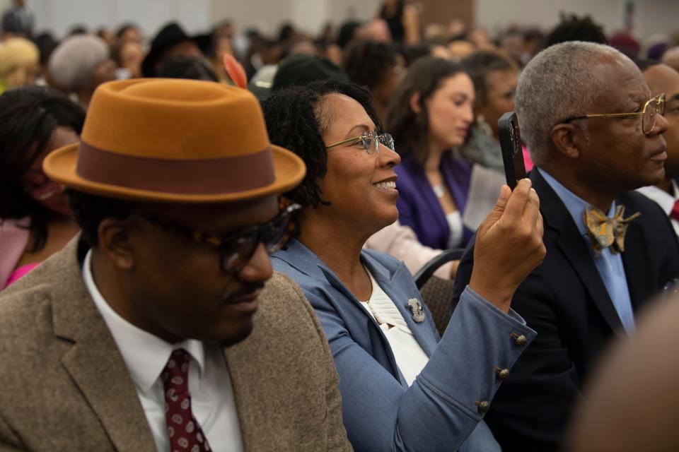 Dr. Krystal Reed records as her daughter, Breia Reed announces where she will be attending residency during the annual School of Medicine Match Day at Meharry Medical College in Nashville, Tenn., Friday, March 15, 2024.