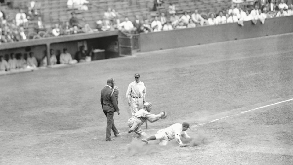 Mandatory Credit: Photo by AP/Shutterstock (6673427a)New York Yankees Babe Ruth slides into home base safe, as Lefty Stewart was careless in his delivery, in Yankee Stadium.