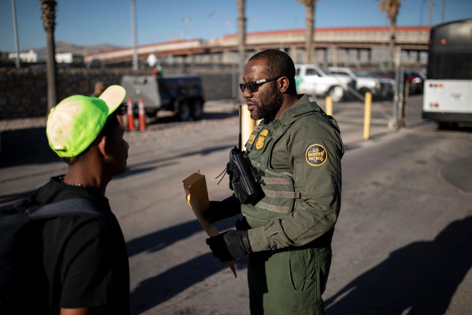 A migrant turns himself into a U.S. Customs and Border Protection Agent at the Paso Del Norte bridge substation in El Paso, Texas, Tuesday, May 9, 2023. Migrants were encouraged by CBP agents to turn themselves in.