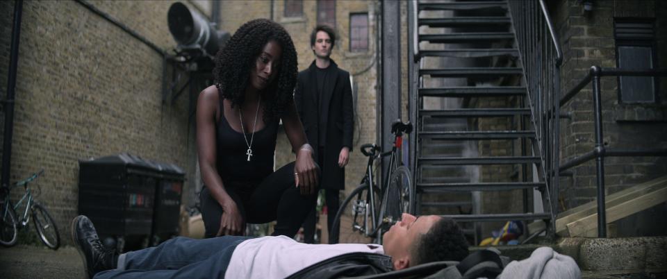 Kirby Howell-Baptiste as Death, ushering someone into the great beyond, and Tom Sturridge as Dream in "The Sandman."