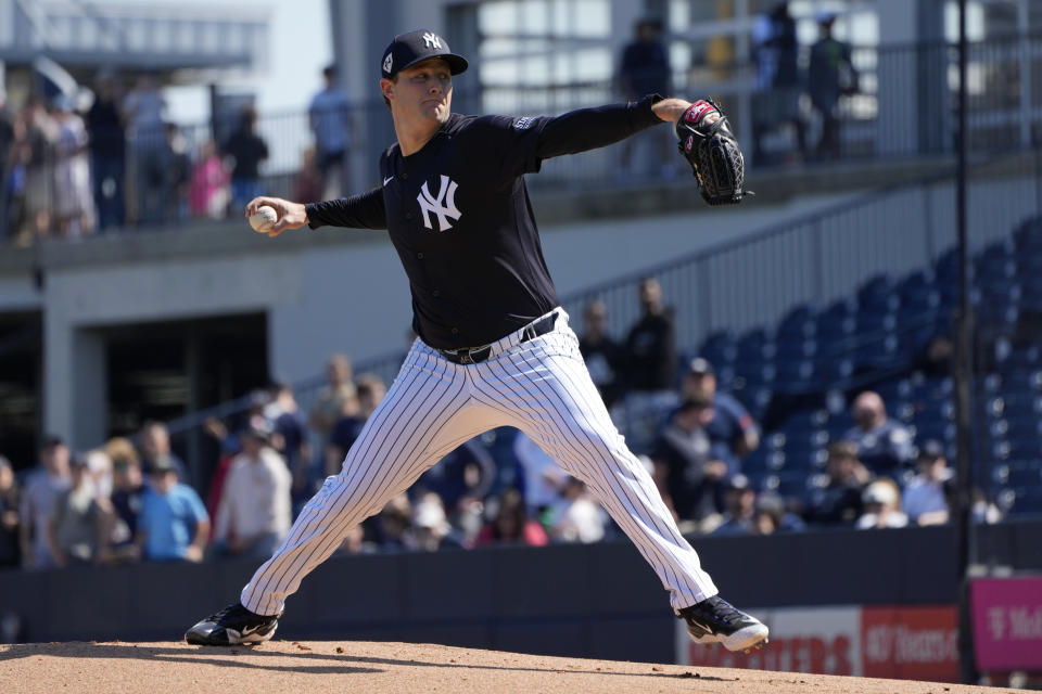 New York Yankees starting pitcher Gerrit Cole throws during a baseball spring training workout Wednesday, Feb. 21, 2024, in Tampa, Fla. (AP Photo/Charlie Neibergall)