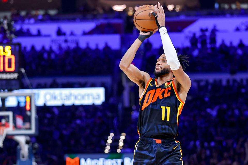 Oklahoma City guard Isaiah Joe (11) shoots a 3-pointer in the second quarter during Game 5 of the Western Conference semifinals between the Oklahoma Thunder and the Dallas Mavericks at the Paycom Center in Oklahoma City, on Wednesday, May 15, 2024.