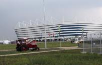 Three Swiss fans arrive in an old-time tractor from home to Kaliningrad stadium, to watch their team playing against Serbia, in Kaliningrad, Russia June 21, 2018. REUTERS/Mariana Bazo