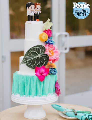 <p>Logan Cole Photography</p> Zeke Smith and Nico Santos' wedding cake.