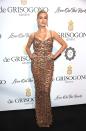 <p>Hailey Baldwin<span class="redactor-invisible-space"> wore an embellished Roberto Cavalli couture gown to attend the DeGrisogono 'Love On The Rocks' party.</span></p>