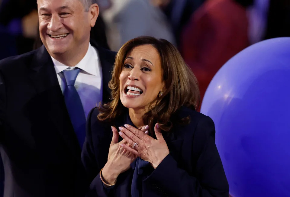 Vice President Kamala Harris and her husband, second gentleman Doug Emhoff, celebrate after she accepted the Democratic presidential nomination on Aug. 22, 2024, in Chicago.