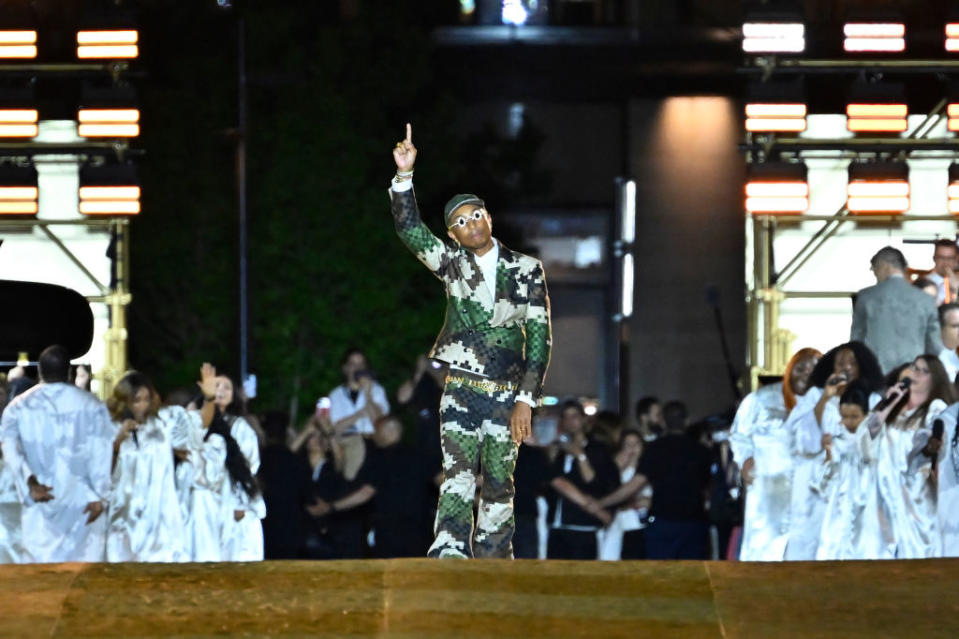 Louis Vuitton Men’s Creative Director Pharrell Williams acknowledges the applause of the audience after the Louis Vuitton Menswear Spring/Summer 2024 show as part of Paris Fashion Week on June 20, 2023, in Paris, France. (Photo by Aurelien Meunier/Getty Images)