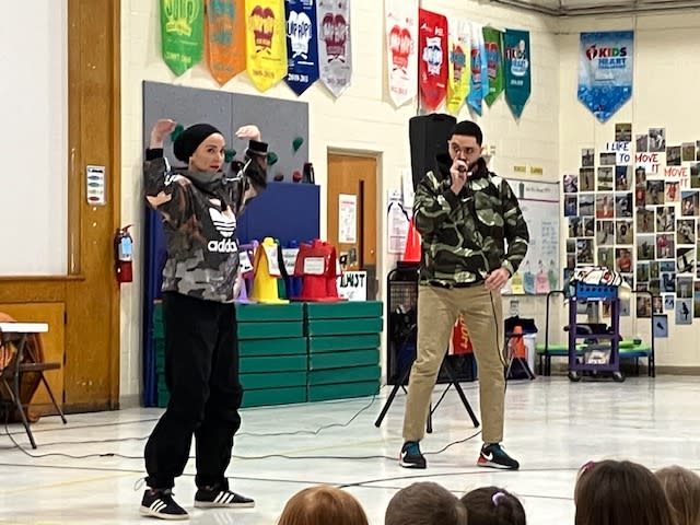 Sackett and her DJ/beatboxing partner MR MiC (Ahmed Zaghbouni) at the Silvis school Feb. 5, 2024.