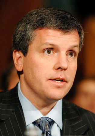 FILE PHOTO - John "Jack" Remondi, vice chairman and CFO of Sallie Mae, testifies during a Senate Banking Committee hearing on the effects of the current lending crisis on the student loan market on Capitol Hill in Washington April 15, 2008. REUTERS/Jonathan Ernst/File Photo