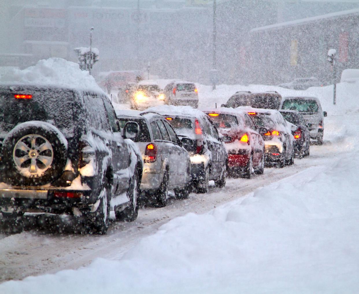 Blizzard on the road. Photo taken 07. februar 2013 in Slovakia Europe town Liptovsky Mikulas. Heavy snowfall paralyzed traffic for several hours.