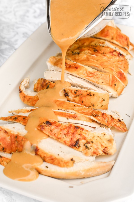 <p>Favorite Family Recipes</p><p>Mom's Famous Turkey Gravy is made from rich, glorious turkey drippings and is the star of Thanksgiving dinner. Perfectly creamy and flavorful every time! </p><p><strong>Get the recipe</strong>: <a href="https://www.favfamilyrecipes.com/turkey-gravy/" rel="nofollow noopener" target="_blank" data-ylk="slk:Turkey Gravy;elm:context_link;itc:0;sec:content-canvas" class="link rapid-noclick-resp"><strong>Turkey Gravy</strong></a></p>