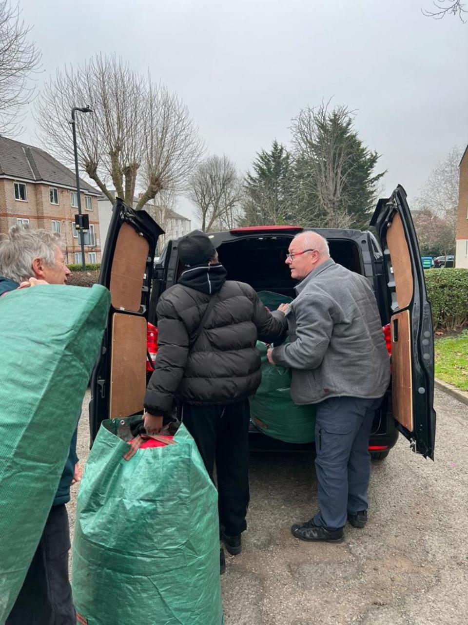 Clint helping to unload his fan’s jackets (Laurence’s Larder)