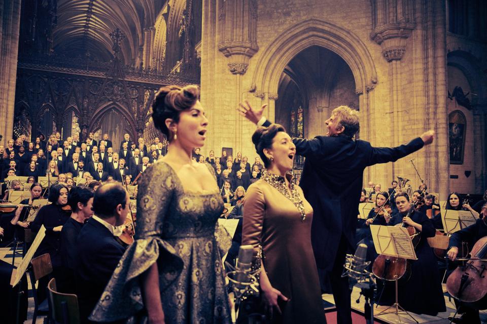 Leonard Bernstein (Bradley Cooper) conducts Mahler's second symphony at Ely Cathedral in a signature scene from "Maestro."