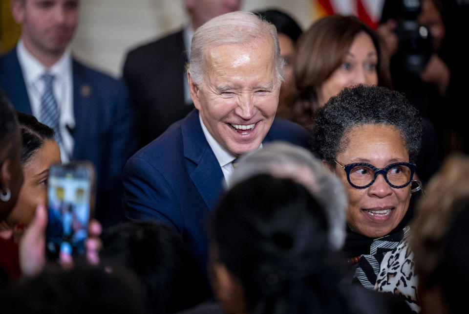 President Joe Biden greet members of the audience during a reception in recognition of Black History Month in the East Room of the White House in Washington, Tuesday, Feb. 6, 2024. (AP Photo/Andrew Harnik)