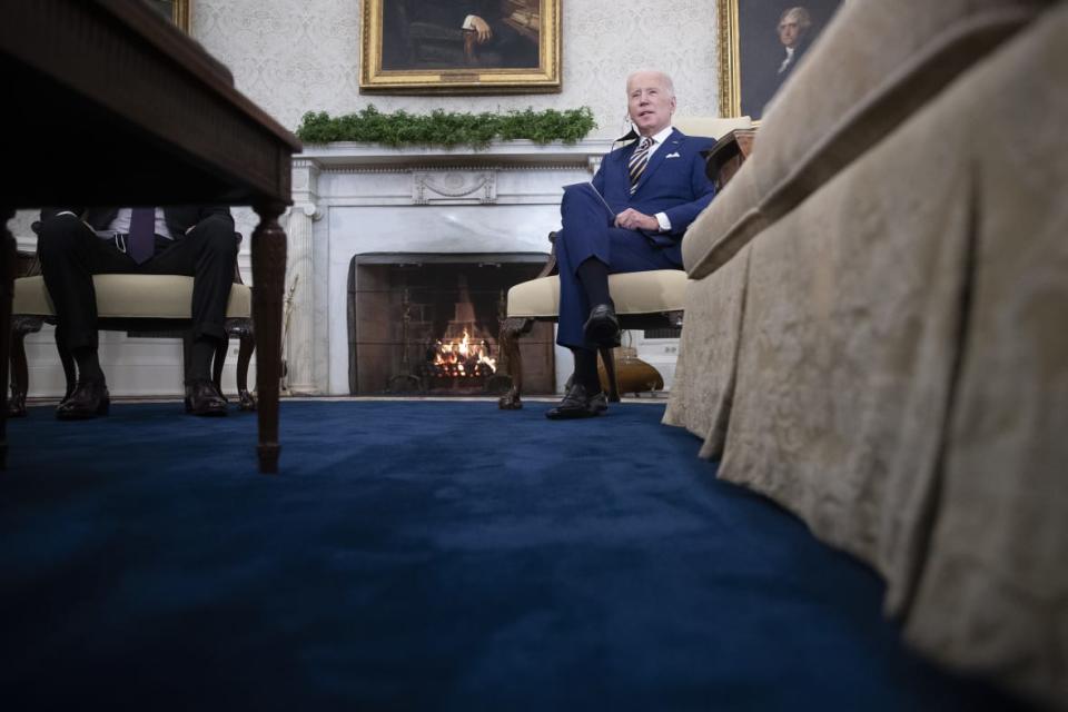 President Joe Biden meets in the Oval Office in January 2022 with Qatar’s emir, Sheikh Tamim Bin Hamad Al-Thani. White House press secretary Karine Jean-Pierre said she sometimes must go directly to Biden for messaging at briefings. (Photo by Tom Brenner-Pool/New York Times/Getty Images)
