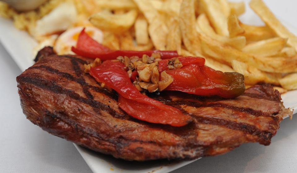 A Portuguese steak with garlic, peppers and fries at O Gil's Restaurant in Fall River.