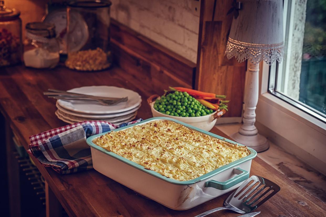 Preparing Traditional Shepard`s Pie in Domestic Kitchen