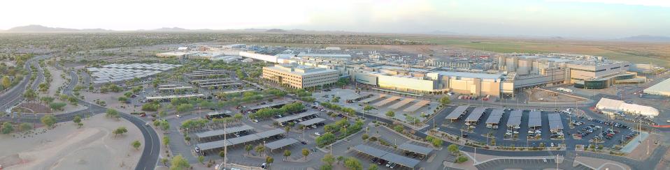 Intel’s Ocotillo campus in Chandler is the company’s largest U.S. manufacturing site. Four factories are connected by a mile-long automated superhighway to create a mega-factory network. On March 23, 2021, Intel announced it will invest about $20 billion to build two additional factories at the Ocotillo campus.