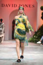 <p>The runway was awash with bright colours, lie this yellow and green kaftan style dress. Photo: Getty Images </p>