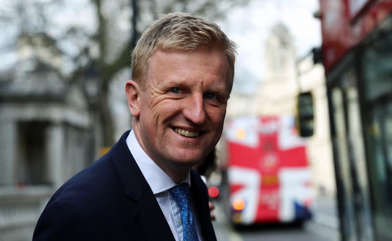 Britain's Culture Secretary Oliver Dowden leaves after attending a meeting to address the government's response to the coronavirus outbreak, at Cabinet Office in London