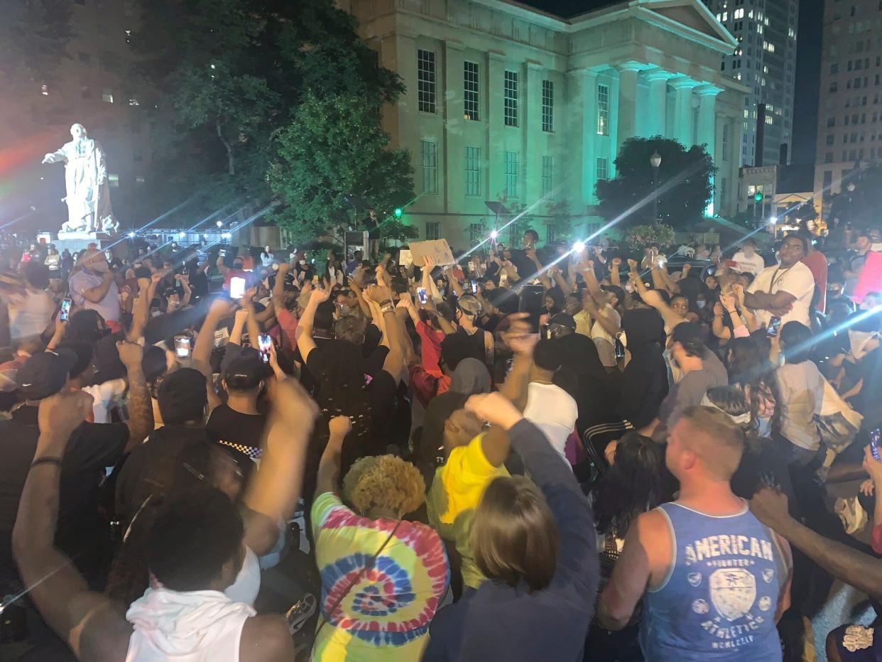 A demonstration in downtown Louisville, KY to protest the death of Breonna Taylor: AP