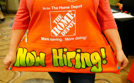 FILE PHOTO: A recruiter for Home Depot is seen at a job fair in Golden, Colorado, June 7, 2017. REUTERS/Rick Wilking/File Photo