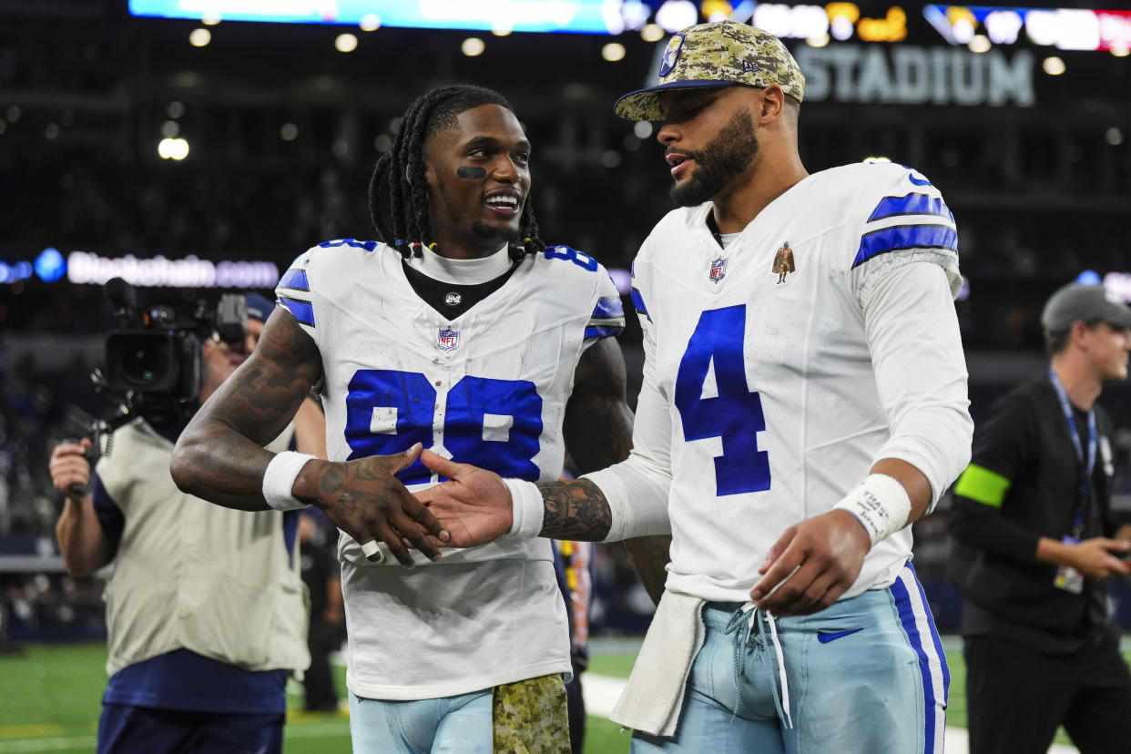 Dak Prescott (4) and CeeDee Lamb are both due for major contract extensions, adding to the Cowboys' laundry list of issues this offseason. (Photo by Cooper Neill/Getty Images)