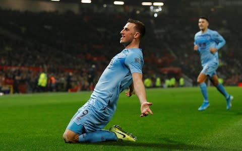 Big Chris Wood opens the scoring - Credit: Reuters