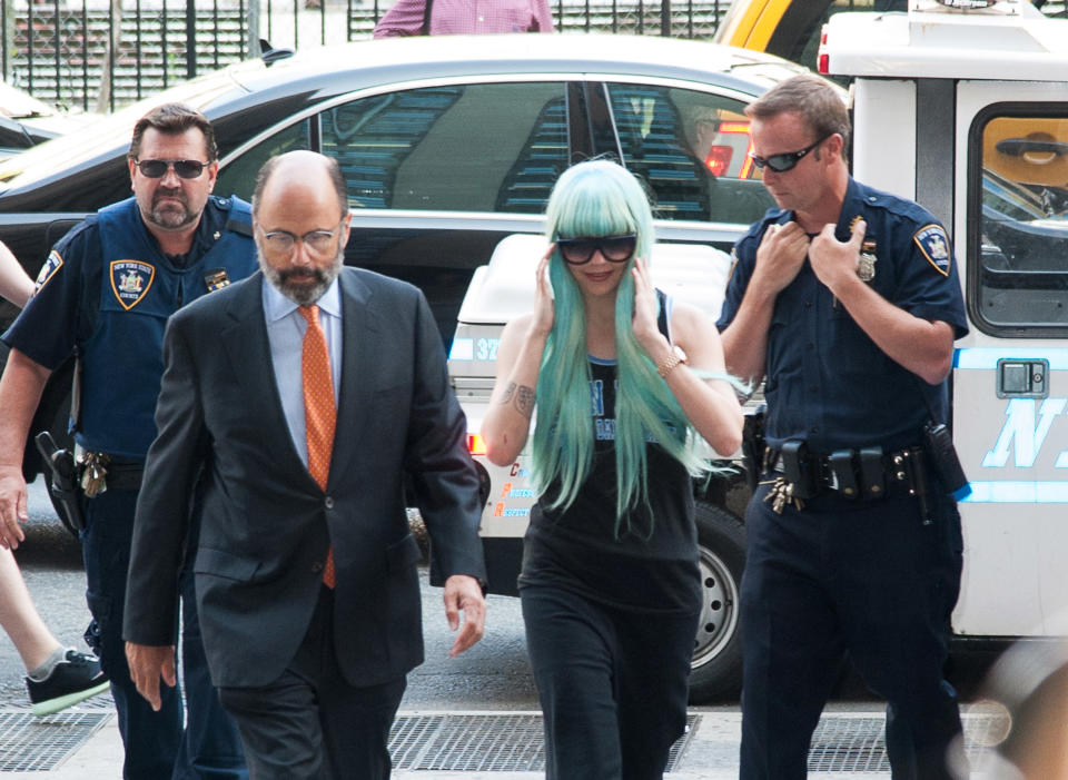 NEW YORK, NY - JULY 09: Amanda Bynes arrives for an appearance at Manhattan Criminal Court on July 9, 2013 in New York City. Bynes is facing charges of reckless endangerment, tampering with evidence and criminal possession of marijuana in relation to her arrest on May 23, 2013. (Photo by Dave Kotinsky/Getty Images)