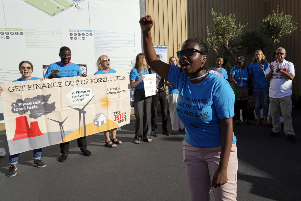 A group of demonstrators participate in an event protesting the use of fossil fuels at the COP27 U.N. Climate Summit, Wednesday, Nov. 9, 2022, in Sharm el-Sheikh, Egypt. (AP Photo/Peter Dejong)