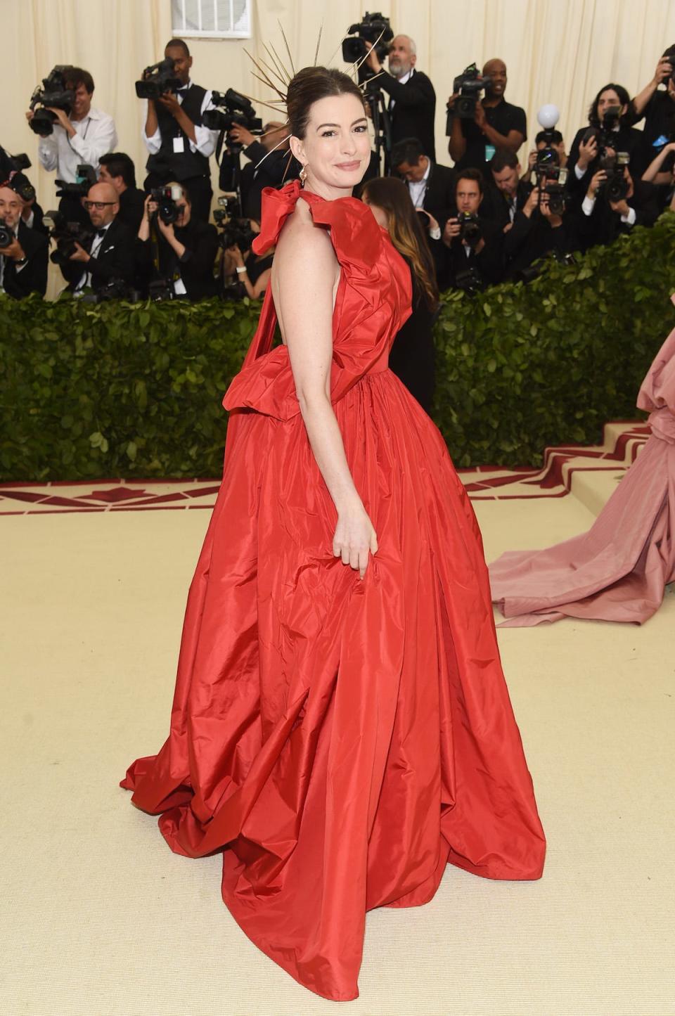 Anne Hathaway attends the Met Gala 2018