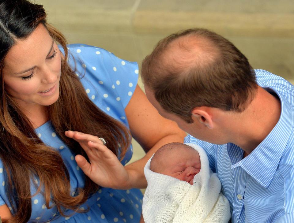 The safe hands of the Duke of Cambridge, as the royal couple and their son who was born yesterday, leave the Lindo Wing of St Mary's Hospital in west London.