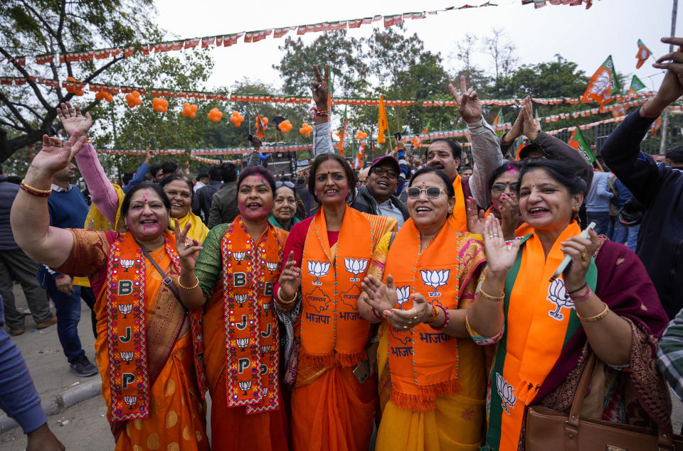 Supporters of India's ruling Bharatiya Janata Party, or BJP, celebrate early leads for the party in Rajasthan state elections in Jaipur, India, Sunday, Dec.3, 2023. Vote counting began Sunday in four Indian states in a test of strength for India's opposition pitted against the ruling party of Prime Minister Narendra Modi ahead of next year's crucial national vote. (AP Photo/Deepak Sharma)