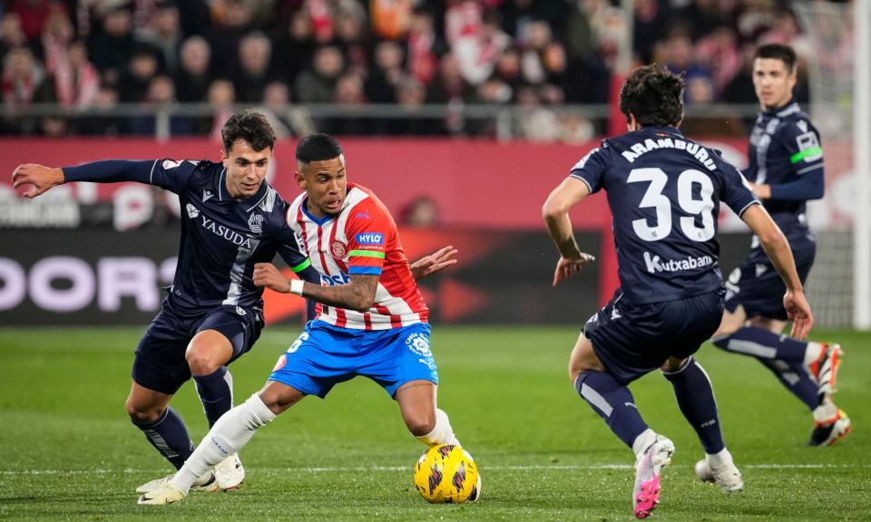 <span>Sávio (centre) in action for Girona, where is he on loan from another CFG-affiliated club, Troyes.</span><span>Photograph: David Borrat/EPA</span>