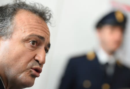 Head of the Palermo Police Operations Squad, Rodolfo Ruperti talks during a news conference after a coordinated crackdown with U.S. police against major crime families looking to rebuild their mafia powerbase in Palermo
