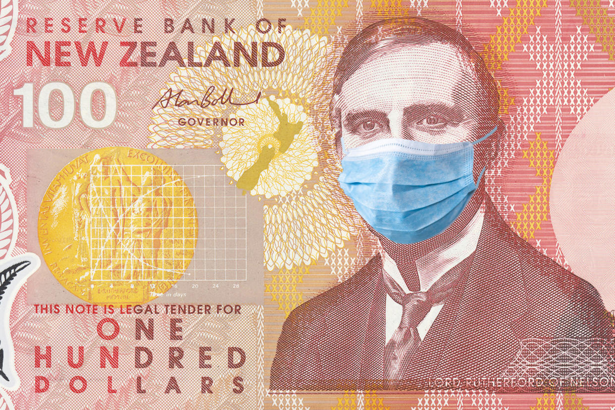 New Zealand quarantine, 100 dollar banknote with medical mask. The concept of epidemic and protection against coronavrius.