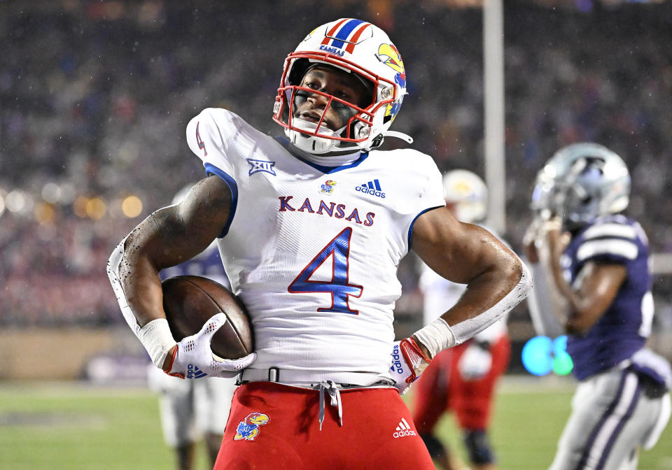 Running back Devin Neal and the Kansas Jayhawks are back in a bowl game. (Photo by Peter G. Aiken/Getty Images)