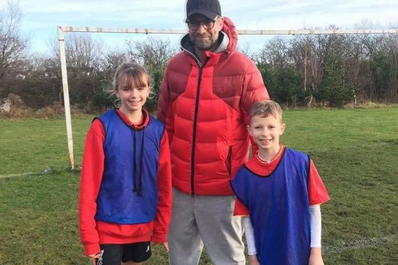 FCFC players Lily and Dominic Hamilton with Jurgen Klopp