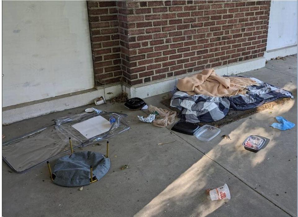 Blankets and trash suggest a trespasser has been sleeping outside the empty historic mansion at 4526 Warwick Blvd., in the Southmoreland neighborhood. The owners of the home want to demolish the structure, against neighbors’ wishes, for a possible commerical development.