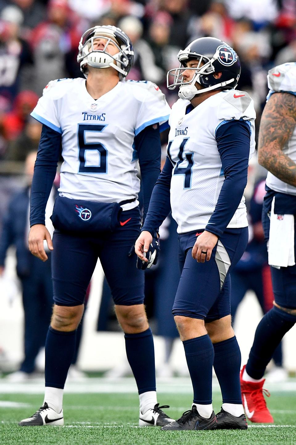 Tennessee Titans punter Brett Kern (6) reacts after kicker Randy Bullock (14) missed a field goal attempt during the second quarter at Gillette Stadium Sunday, Nov. 28, 2021 in Foxborough, Mass. 