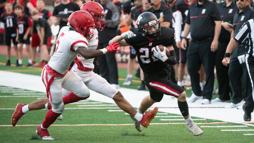 Haddonfield's Charlie Klaus runs the ball during the football game between Haddonfield and Paulsboro played at Haddonfield High School on Friday, September 1, 2023.  Haddonfield defeated Paulsboro, 35-7.  