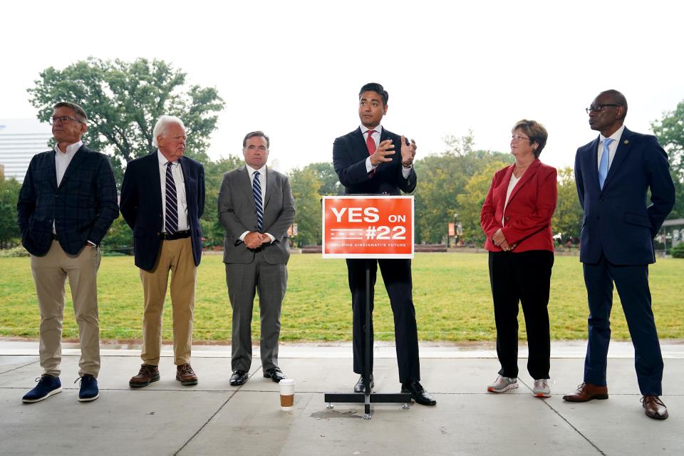 Five former mayors of Cincinnati joined current mayor, Aftab Pureval, center, to lobby for the sale of the 143-year-old, city-owned Cincinnati Southern Railway to Norfolk Southern Corp., The final decision is up to voters in the November election.