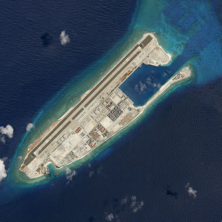 Satellite photo dated March 19, 2018 shows Fiery Cross Reef. Planet Labs Inc/Handout via REUTERS