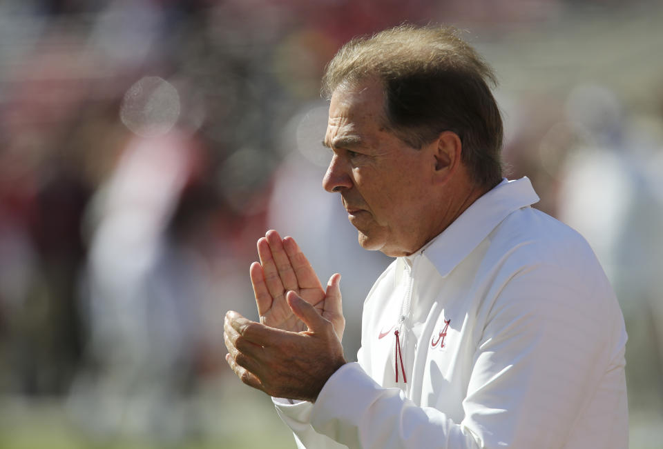 Nov 13, 2021; Tuscaloosa, Alabama, USA; Alabama head coach Nick Saban watches the Crimson Tide warm up before playing <a class="link " href="https://sports.yahoo.com/ncaaf/teams/n-mex-st/" data-i13n="sec:content-canvas;subsec:anchor_text;elm:context_link" data-ylk="slk:New Mexico State;sec:content-canvas;subsec:anchor_text;elm:context_link;itc:0">New Mexico State</a> at Bryant-Denny Stadium. Mandatory Credit: Gary Cosby Jr.-USA TODAY Sports