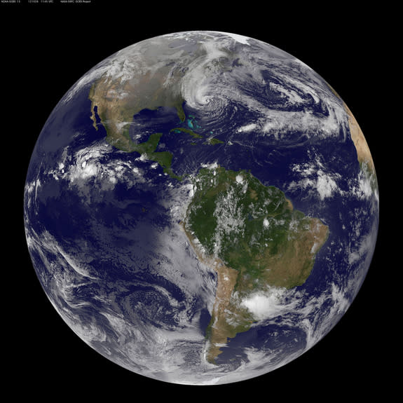 NOAA's GOES-13 satellite captured this visible image of the massive Hurricane Sandy on Oct. 28 at 1302 UTC (9:02 a.m. EDT). The line of clouds from the Gulf of Mexico north are associated with the cold front that Sandy is merging with. Sandy's