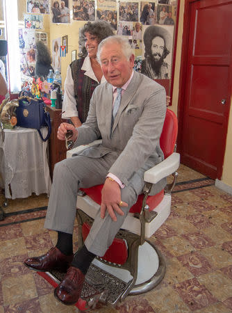 Britain's Prince Charles visits a barbershop in Havana, Cuba March 25, 2019. Arthur Edwards/Pool via REUTERS