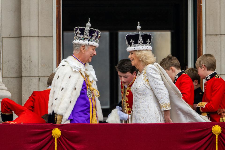 King Charles III and Queen Camilla stand on the Buckingham Palace balcony during the Coronation of King Charles III and Queen Camilla on May 6, 2023.