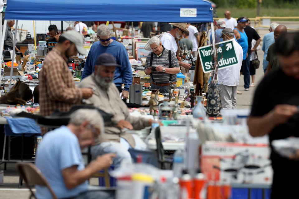 Customers shop at the Dixieland Flea Market in Waterford, Saturday, Aug. 3, 2019. The 80,000-square-foot flea market is the largest and oldest in the region. More than 80 vendors sell their items inside and 100 vendors are outside in the large parking lot.