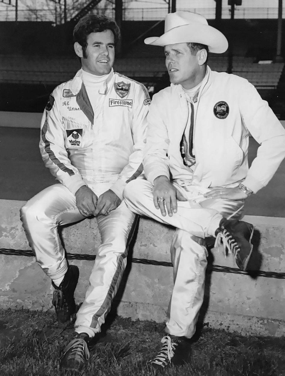 Al, left, and brother Bobby Unser prepare for the Indiana Classic 100-mile USAC stock car race at the Indiana StateFairgrounds in 1972.