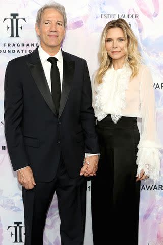 Monica Schipper/Getty David E. Kelley and Michelle Pfeiffer